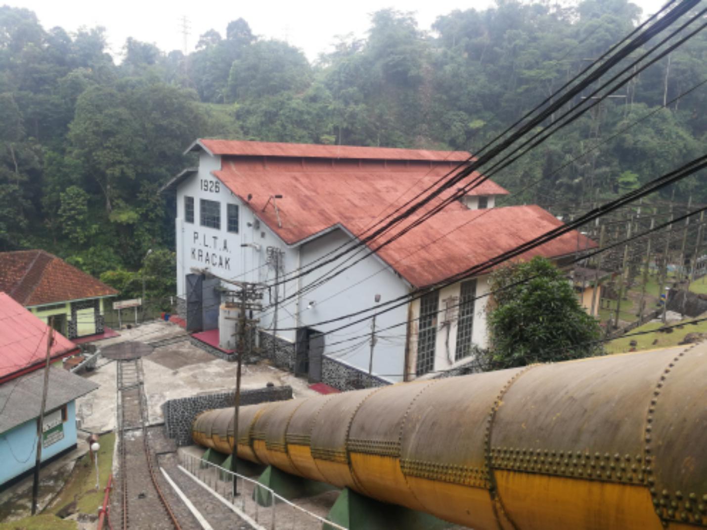 Run-of-river powerhouse, penstock and switchyard during a TC HYDRO technical site visit