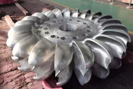 Large stainless-steel Pelton runner finished at the TC works