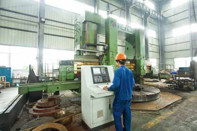 Vertical lathe machining a large runner