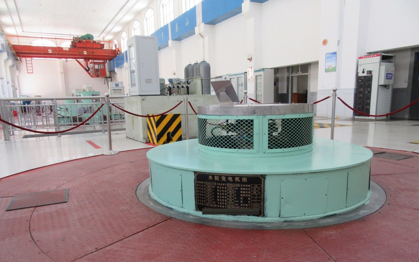 Vertical Francis turbine-generator unit rated 6500 kW at 6300 V, with rating nameplate